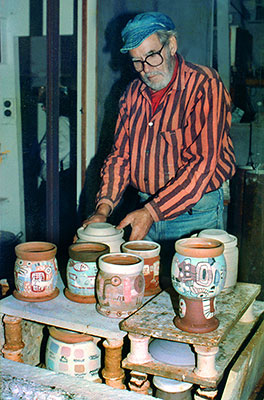 Gus McLaren Potter Warrandyte Australia, loading a kiln
