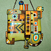Gus McLaren ceramic wallhanging with colourful geometric shape designs