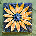 Brown flower tile with orange petals