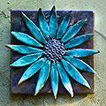 Brown flower tile with aqua petals